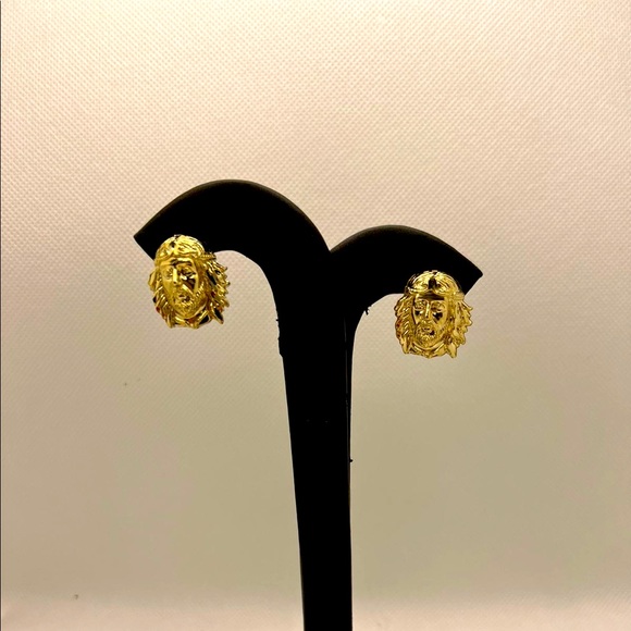10K yellow gold Jesus stud earrings.